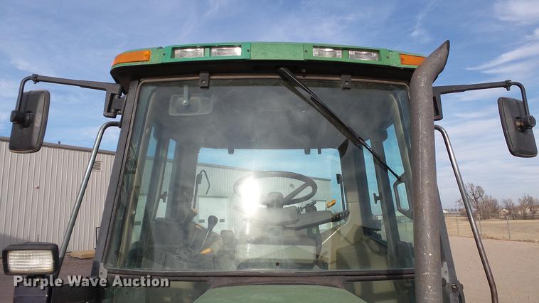 image for item DC5668 1998 John Deere 6410 MFWD tractor