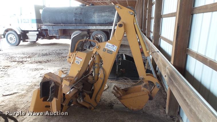 image for item DC5670 Case D125 skid steer backhoe attachment
