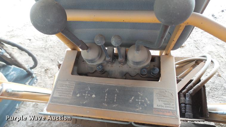 image for item DC5670 Case D125 skid steer backhoe attachment