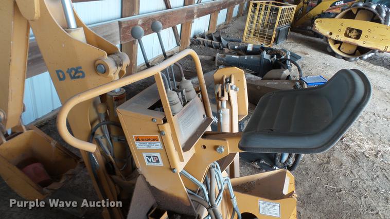 image for item DC5670 Case D125 skid steer backhoe attachment