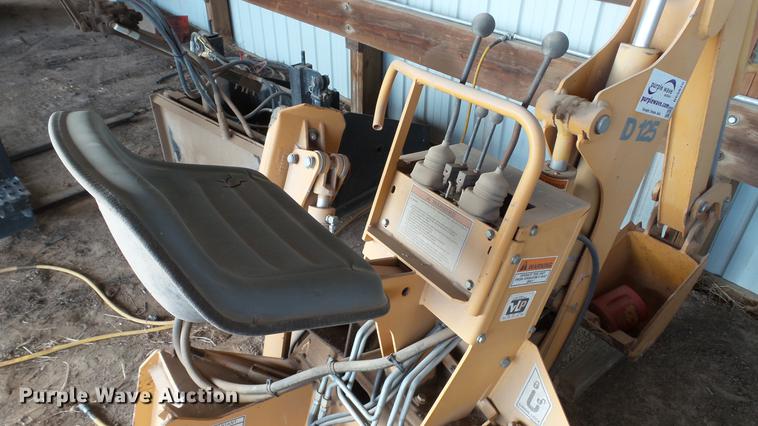 image for item DC5670 Case D125 skid steer backhoe attachment