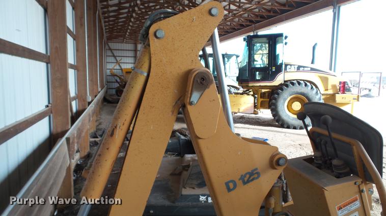 image for item DC5670 Case D125 skid steer backhoe attachment