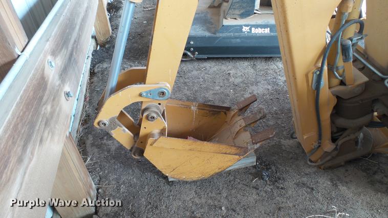 image for item DC5670 Case D125 skid steer backhoe attachment