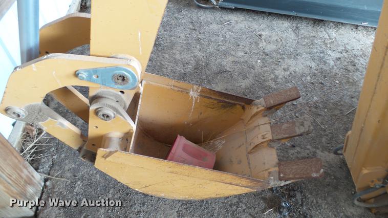 image for item DC5670 Case D125 skid steer backhoe attachment