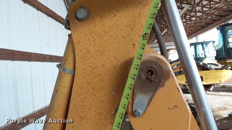 image for item DC5670 Case D125 skid steer backhoe attachment