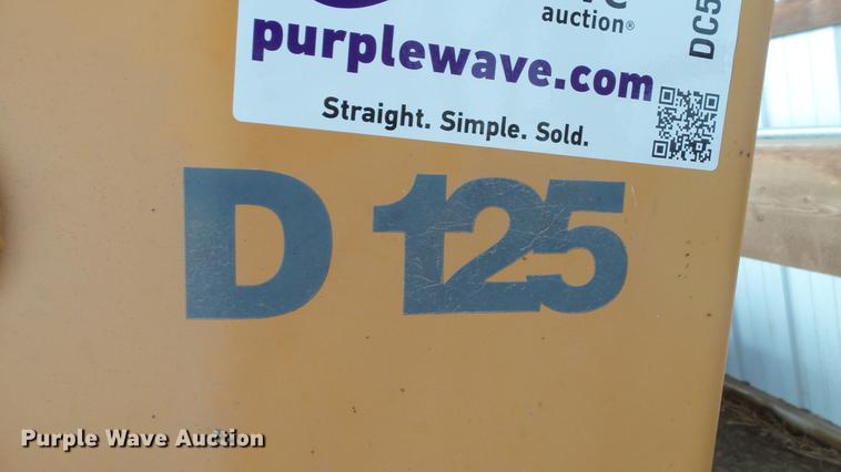 image for item DC5670 Case D125 skid steer backhoe attachment