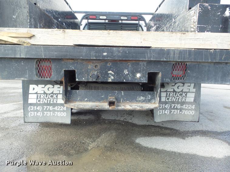 image for item DC7393 1999 Ford F350 Super Duty Lariat Crew Cab flatbed pickup truck