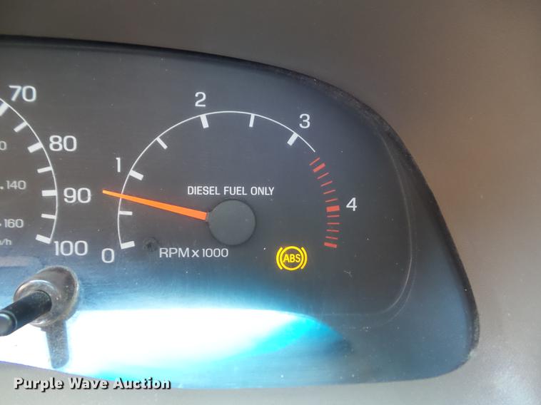 image for item DC7393 1999 Ford F350 Super Duty Lariat Crew Cab flatbed pickup truck