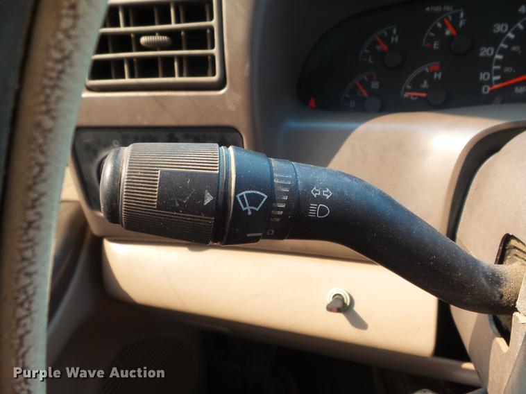 image for item DC7393 1999 Ford F350 Super Duty Lariat Crew Cab flatbed pickup truck