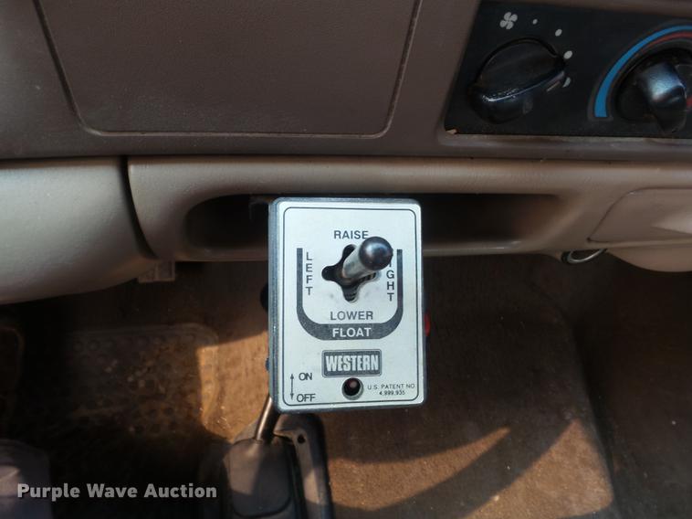 image for item DC7393 1999 Ford F350 Super Duty Lariat Crew Cab flatbed pickup truck