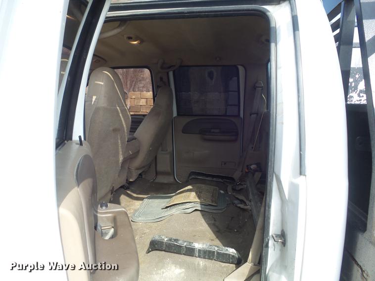 image for item DC7393 1999 Ford F350 Super Duty Lariat Crew Cab flatbed pickup truck