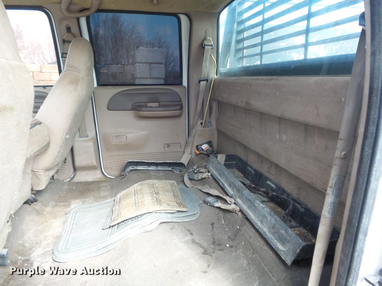 image for item DC7393 1999 Ford F350 Super Duty Lariat Crew Cab flatbed pickup truck