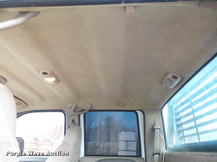 image for item DC7393 1999 Ford F350 Super Duty Lariat Crew Cab flatbed pickup truck