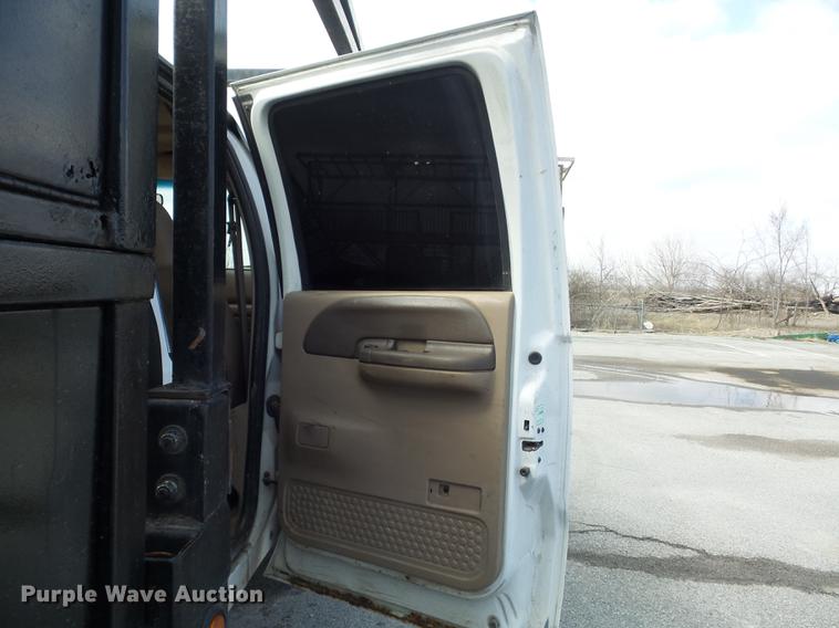 image for item DC7393 1999 Ford F350 Super Duty Lariat Crew Cab flatbed pickup truck