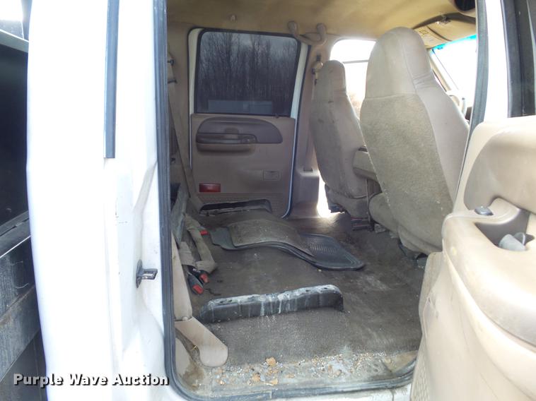 image for item DC7393 1999 Ford F350 Super Duty Lariat Crew Cab flatbed pickup truck