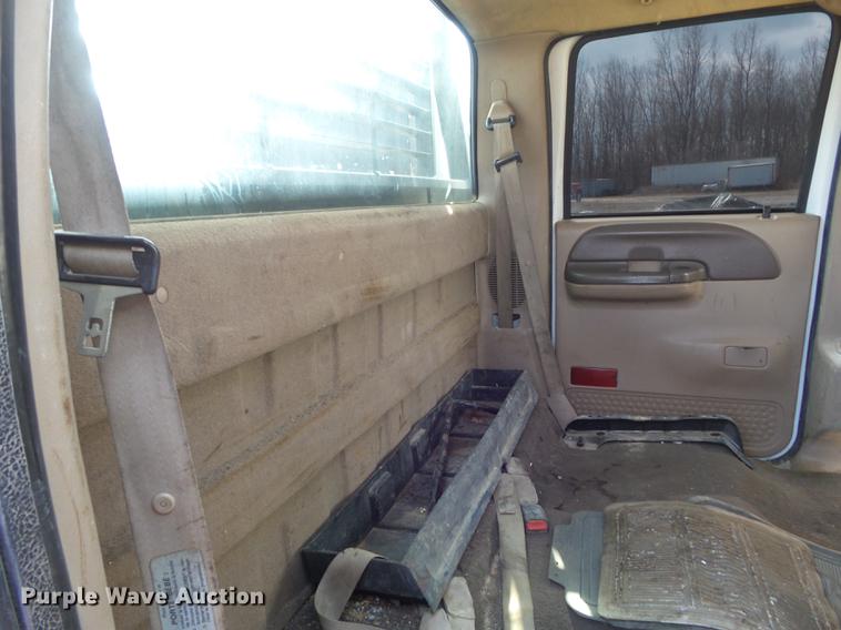 image for item DC7393 1999 Ford F350 Super Duty Lariat Crew Cab flatbed pickup truck