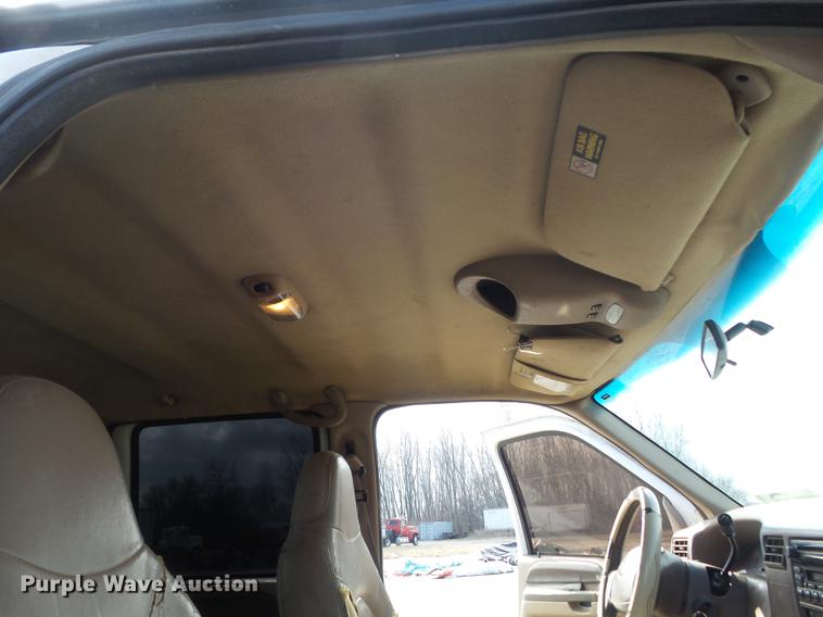 image for item DC7393 1999 Ford F350 Super Duty Lariat Crew Cab flatbed pickup truck