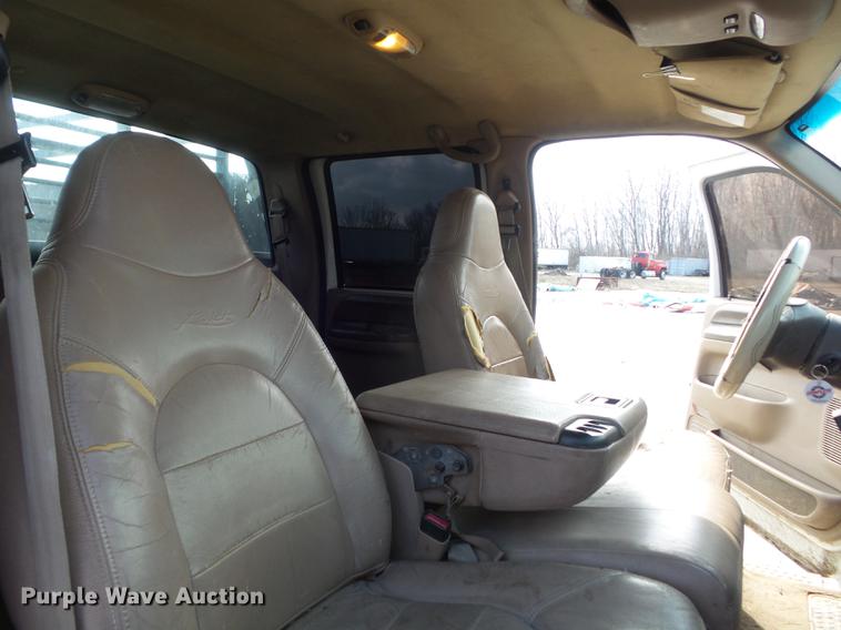 image for item DC7393 1999 Ford F350 Super Duty Lariat Crew Cab flatbed pickup truck