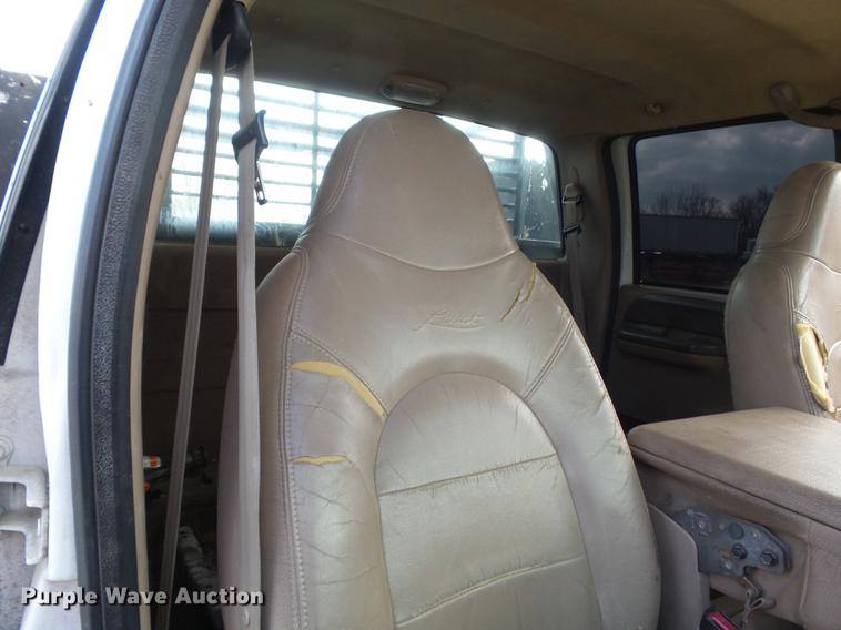 image for item DC7393 1999 Ford F350 Super Duty Lariat Crew Cab flatbed pickup truck