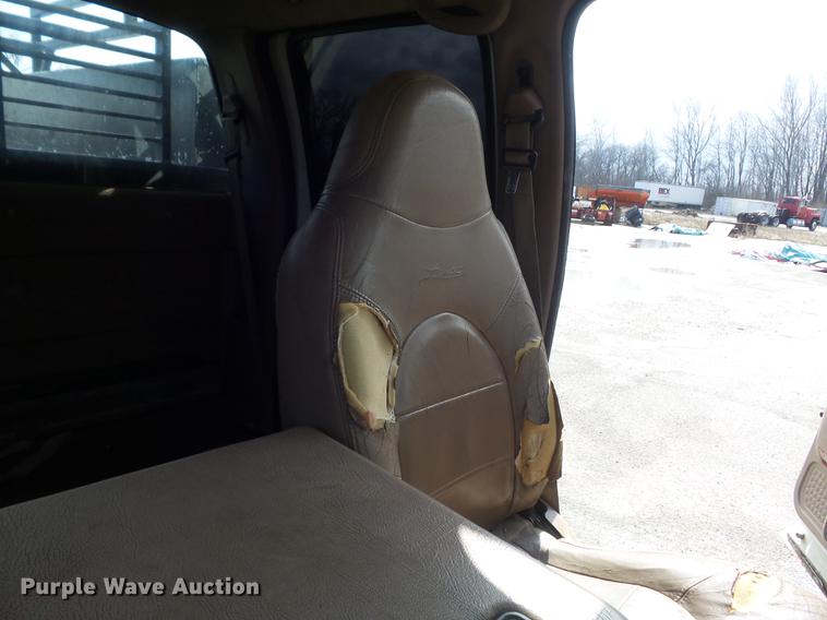 image for item DC7393 1999 Ford F350 Super Duty Lariat Crew Cab flatbed pickup truck