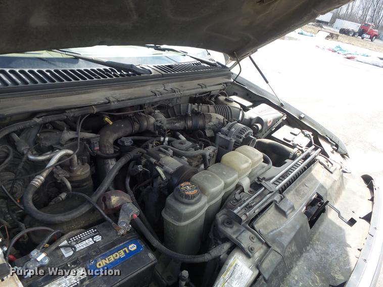 image for item DC7393 1999 Ford F350 Super Duty Lariat Crew Cab flatbed pickup truck