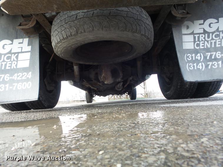 image for item DC7393 1999 Ford F350 Super Duty Lariat Crew Cab flatbed pickup truck