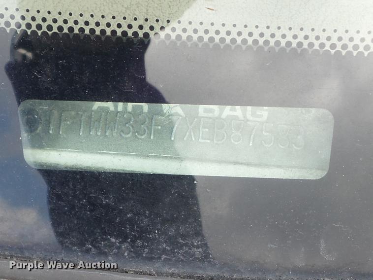 image for item DC7393 1999 Ford F350 Super Duty Lariat Crew Cab flatbed pickup truck