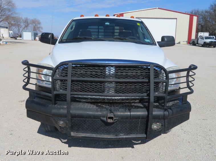 image for item DF9877 2007 Dodge Ram 3500 Quad Cab flatbed pickup truck