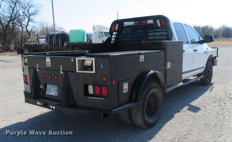 image for item DF9877 2007 Dodge Ram 3500 Quad Cab flatbed pickup truck
