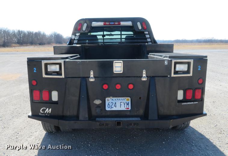 image for item DF9877 2007 Dodge Ram 3500 Quad Cab flatbed pickup truck