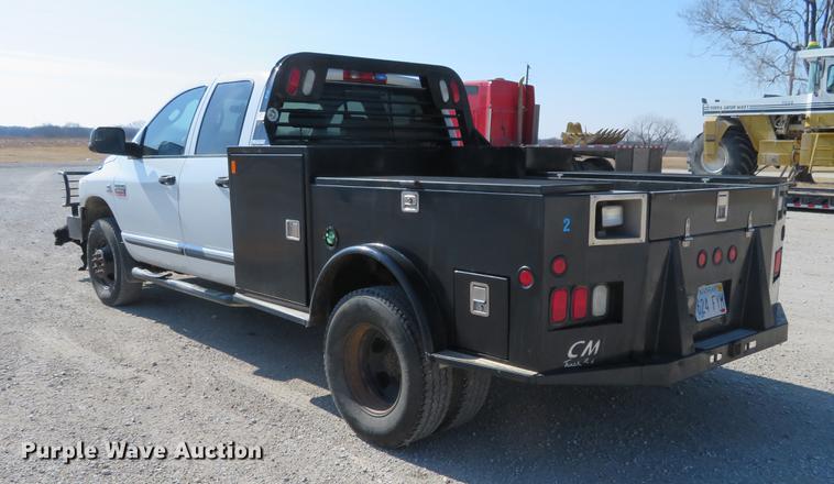 image for item DF9877 2007 Dodge Ram 3500 Quad Cab flatbed pickup truck