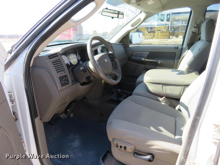 image for item DF9877 2007 Dodge Ram 3500 Quad Cab flatbed pickup truck