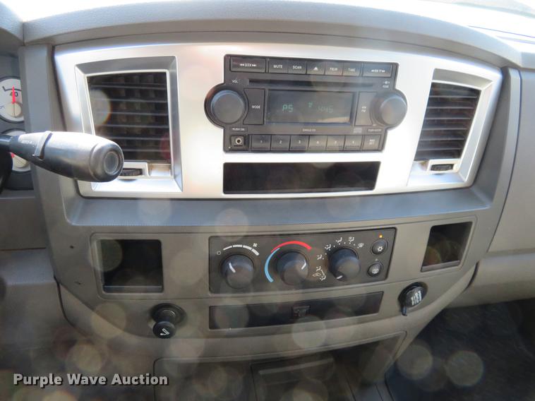 image for item DF9877 2007 Dodge Ram 3500 Quad Cab flatbed pickup truck