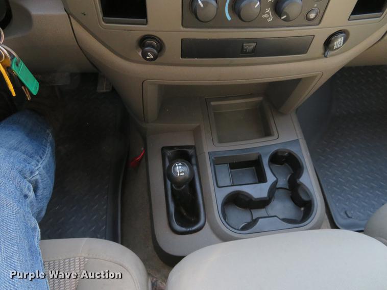 image for item DF9877 2007 Dodge Ram 3500 Quad Cab flatbed pickup truck