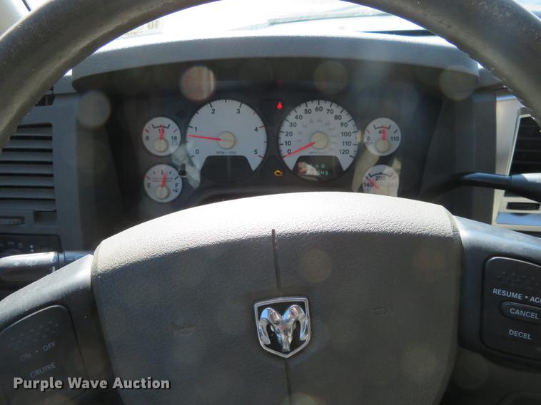 image for item DF9877 2007 Dodge Ram 3500 Quad Cab flatbed pickup truck