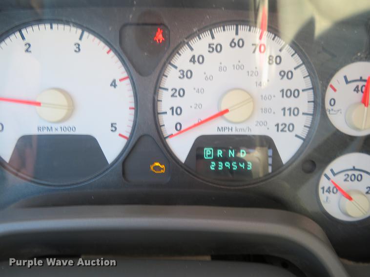 image for item DF9877 2007 Dodge Ram 3500 Quad Cab flatbed pickup truck