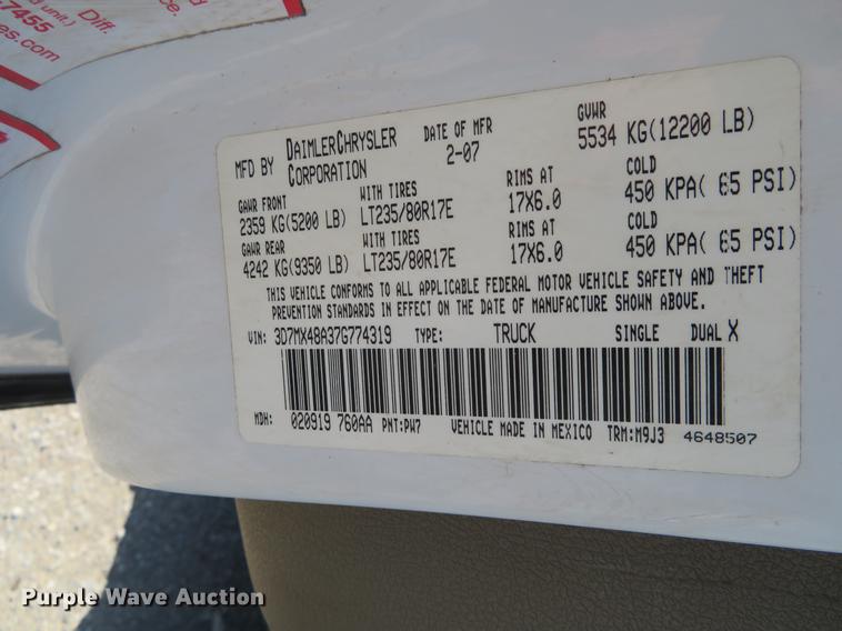 image for item DF9877 2007 Dodge Ram 3500 Quad Cab flatbed pickup truck