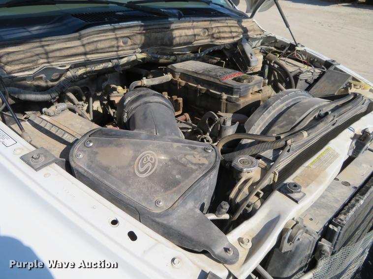 image for item DF9877 2007 Dodge Ram 3500 Quad Cab flatbed pickup truck