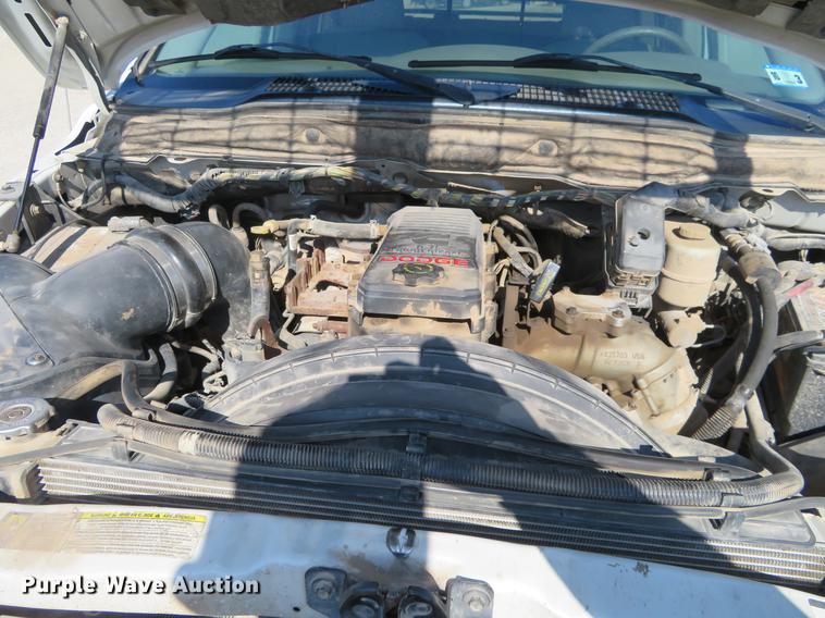 image for item DF9877 2007 Dodge Ram 3500 Quad Cab flatbed pickup truck