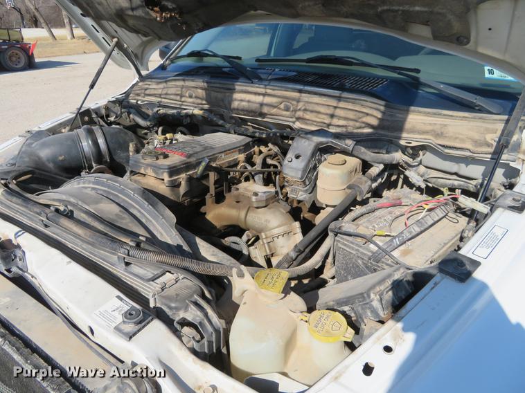 image for item DF9877 2007 Dodge Ram 3500 Quad Cab flatbed pickup truck