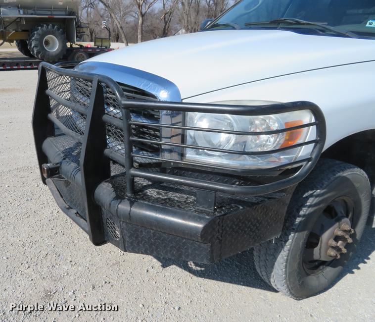 image for item DF9877 2007 Dodge Ram 3500 Quad Cab flatbed pickup truck