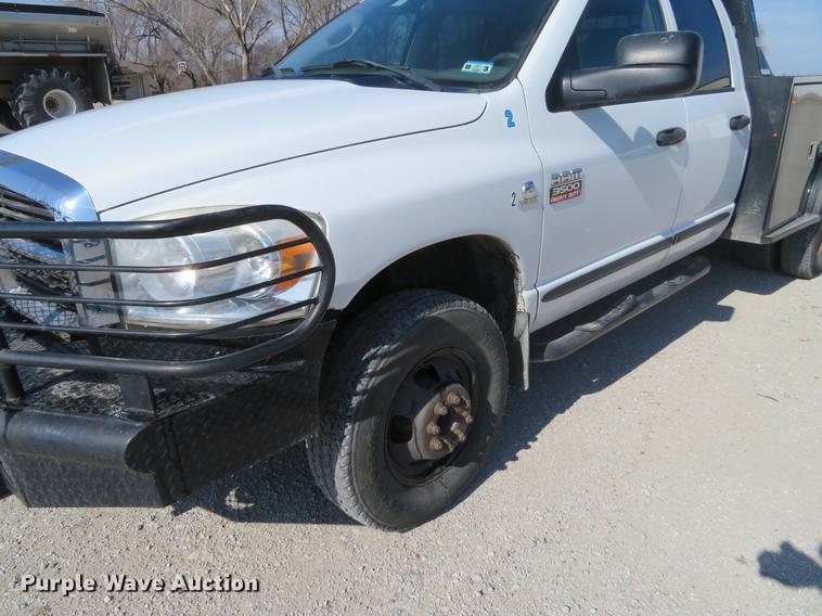 image for item DF9877 2007 Dodge Ram 3500 Quad Cab flatbed pickup truck