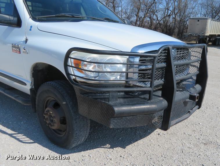 image for item DF9877 2007 Dodge Ram 3500 Quad Cab flatbed pickup truck