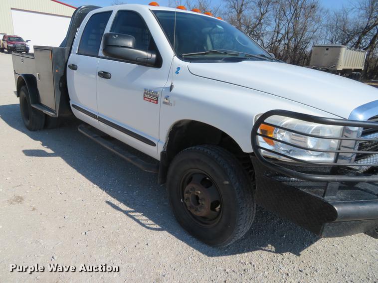 image for item DF9877 2007 Dodge Ram 3500 Quad Cab flatbed pickup truck
