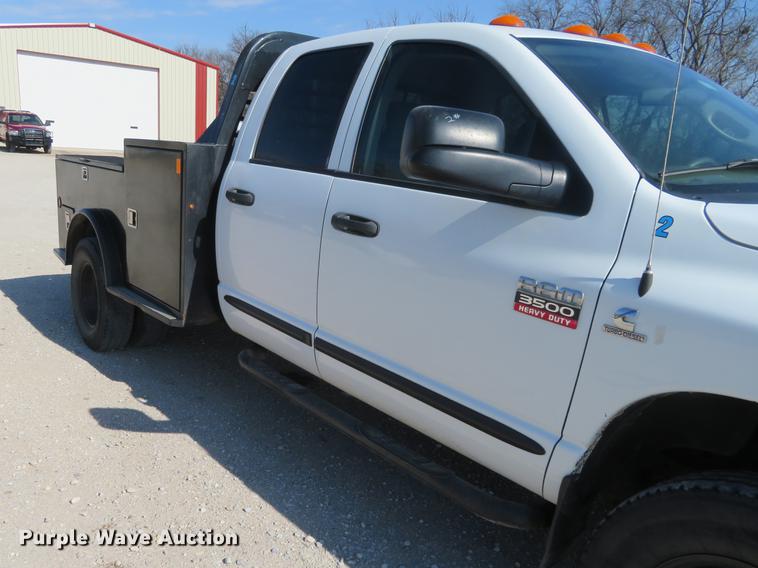 image for item DF9877 2007 Dodge Ram 3500 Quad Cab flatbed pickup truck
