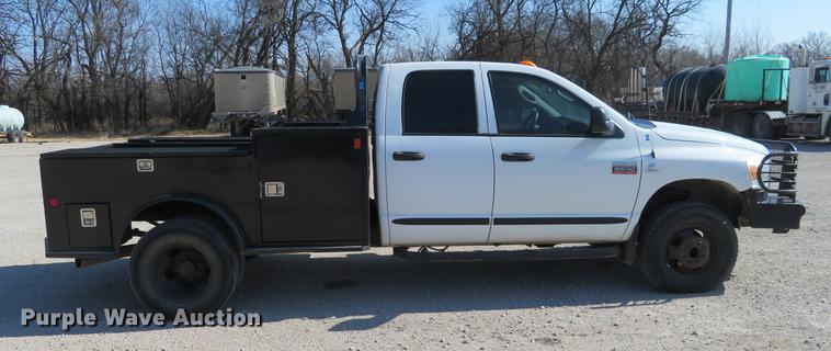 image for item DF9877 2007 Dodge Ram 3500 Quad Cab flatbed pickup truck