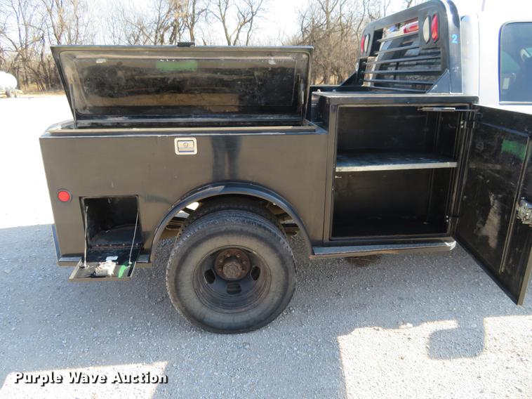 image for item DF9877 2007 Dodge Ram 3500 Quad Cab flatbed pickup truck