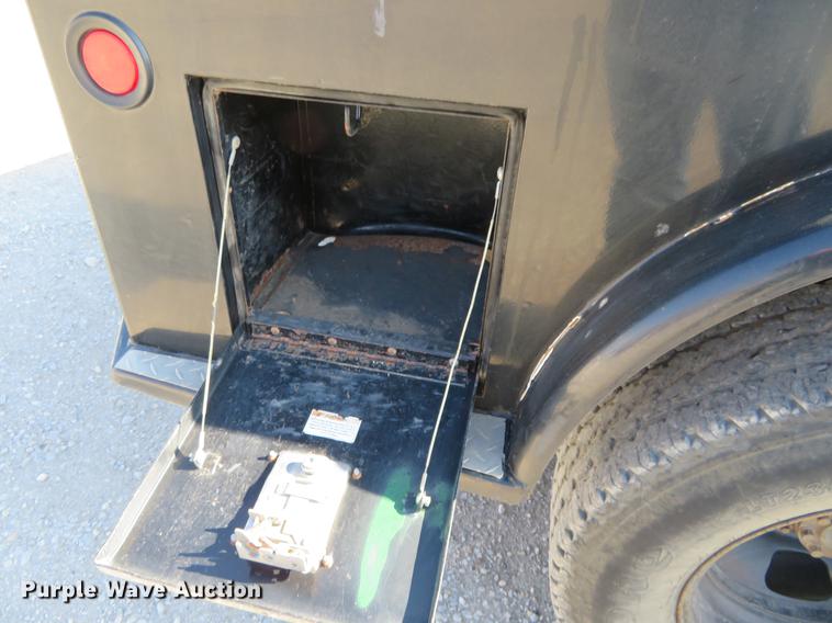 image for item DF9877 2007 Dodge Ram 3500 Quad Cab flatbed pickup truck