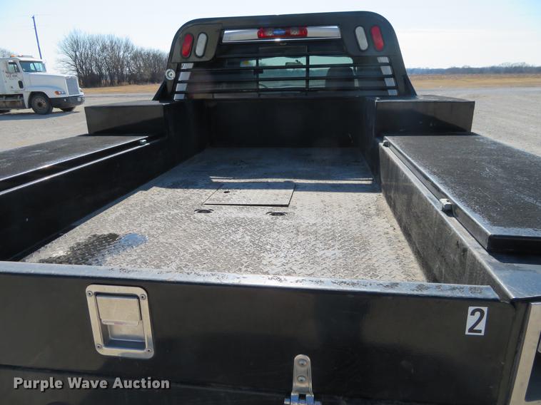 image for item DF9877 2007 Dodge Ram 3500 Quad Cab flatbed pickup truck