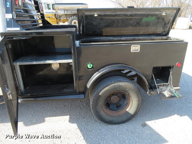 image for item DF9877 2007 Dodge Ram 3500 Quad Cab flatbed pickup truck